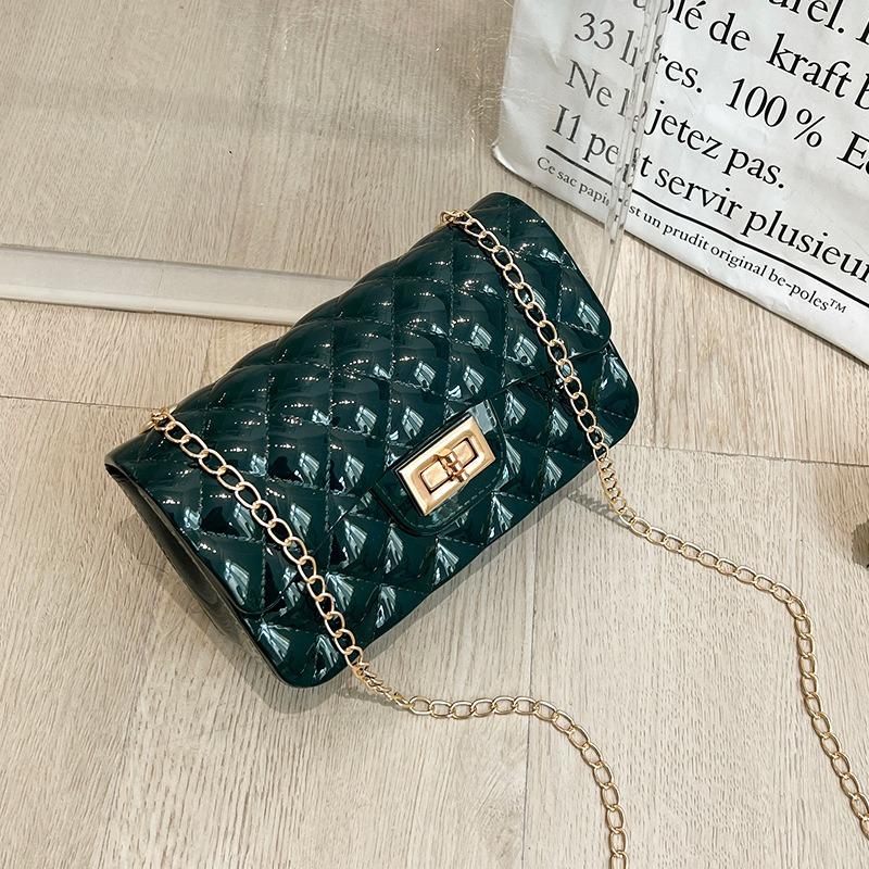 Fashion pearl shoulder jelly bag, women's versatile diamond lipstick change bag, one piece.