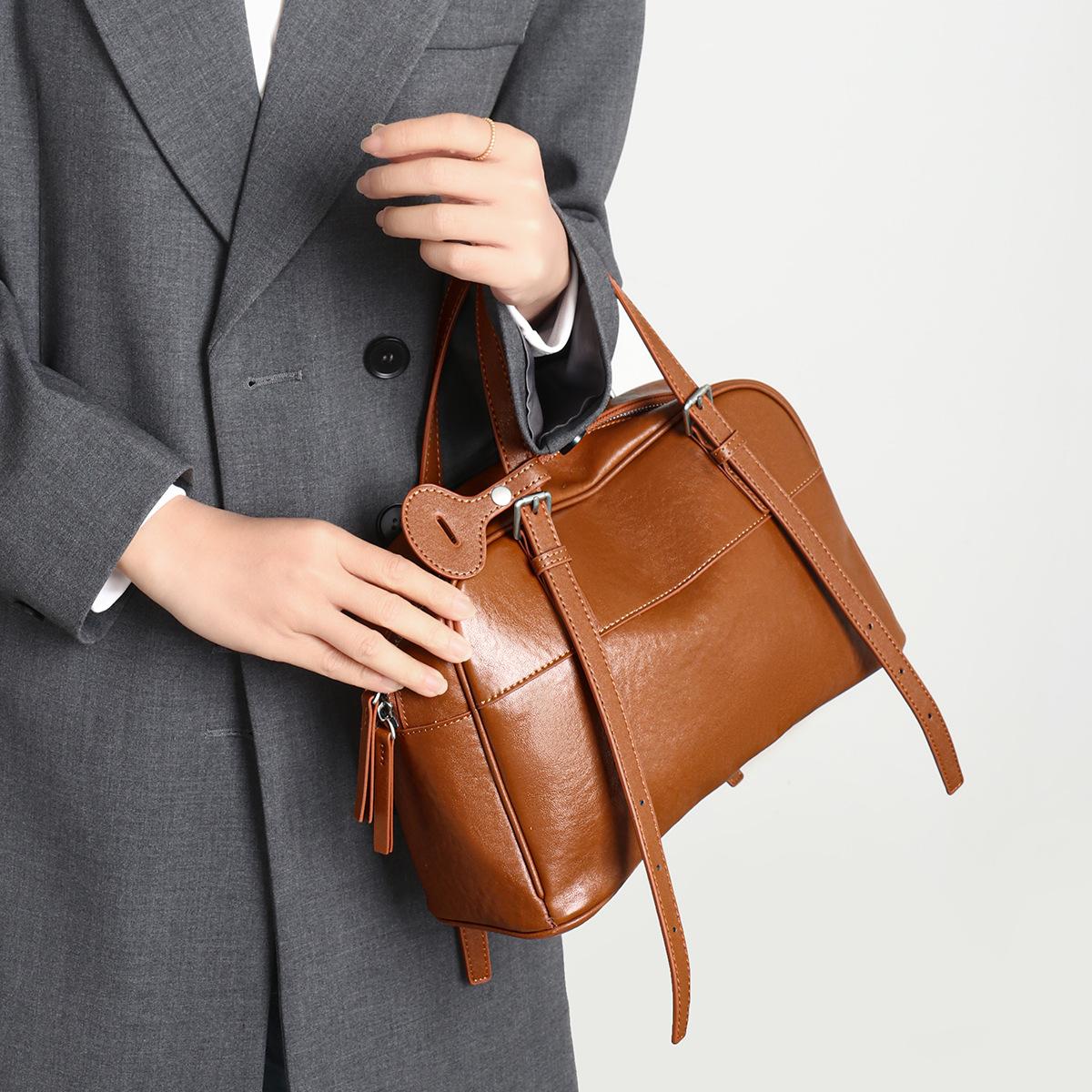 

First Layer Cowhide Boston Bag with Niche Design, Simple Commuting Leather, Large Capacity, Versatile, Single Shoulder Diagonal Cross Women s Bag коричневый