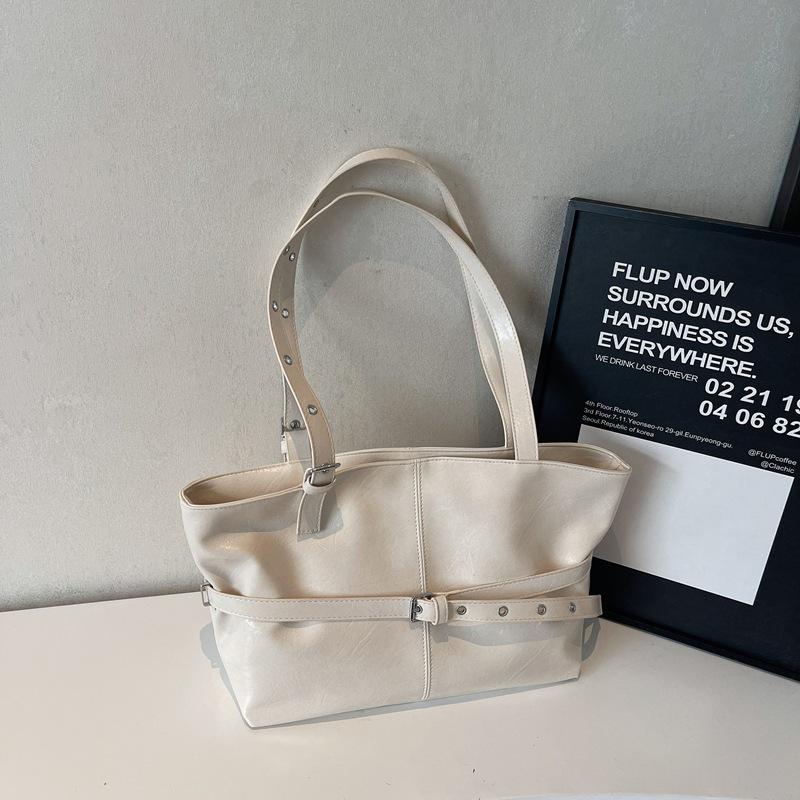 

Женская сумка-тоут большой вместимости 2025 новая летняя простая и универсальная на плечо подмышку сумка с чувством высокого класса рабочая сумка для поездок белый