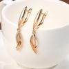 Fashion geometric zircon earrings women's light luxury rose gold earrings