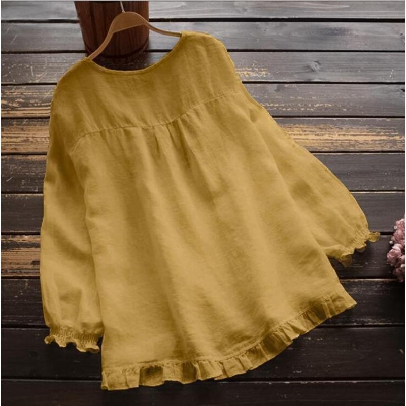 Women S Loose Fit Long Sleeve Round Neck Shirt With Ruffled Cuffs And Hem