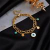 Gold Tone Double Layer Evil Eye Charm Bracelet with Turquoise Accents