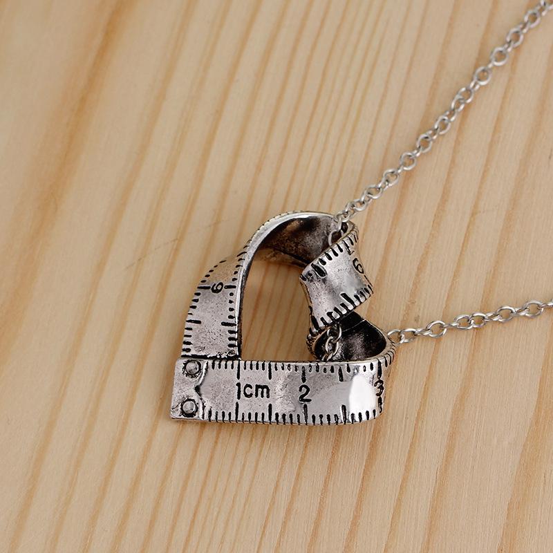 Heart shaped tape measure pendant, accessory, European and American accessories, versatile creative retro pendant