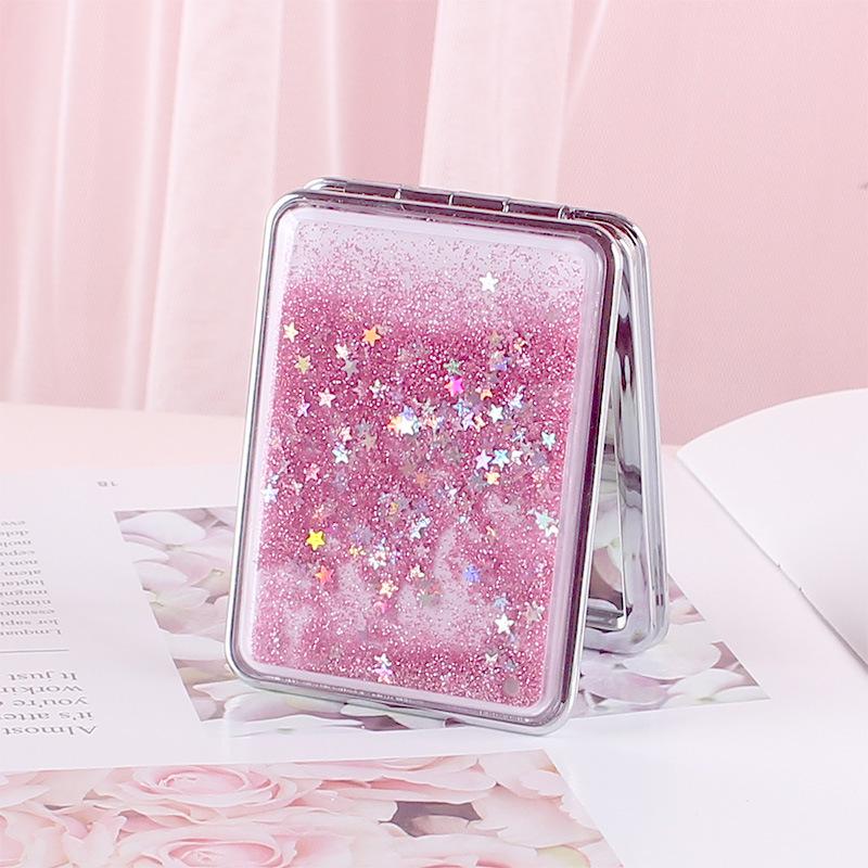 Girlish Heart Double-Sided Portable Makeup Mirror - Cute, Compact, and Foldable.