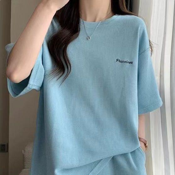 Trendy Summer Two-Piece Running Set: Loose Fit Short-Sleeve Top & Slimming Shorts for Female Students