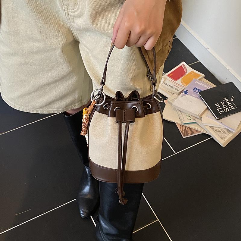 Premium handbag bag women's 2025 new autumn and winter shoulder versatile messenger bag Korean version drawstring hand carrying bucket bag