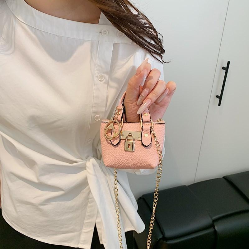Korean version of girls' crossbody portable small square bag summer new personalized classic children's hand carry one shoulder crossbody bag