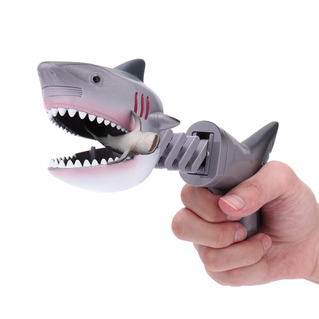 Lustiger Haifisch-Teleskop-Feder-Manipulator Spielzeug-Clip Biss-Hand Dinosaurier Streich Eltern-Kind-Interaktionsspielzeug weiß
