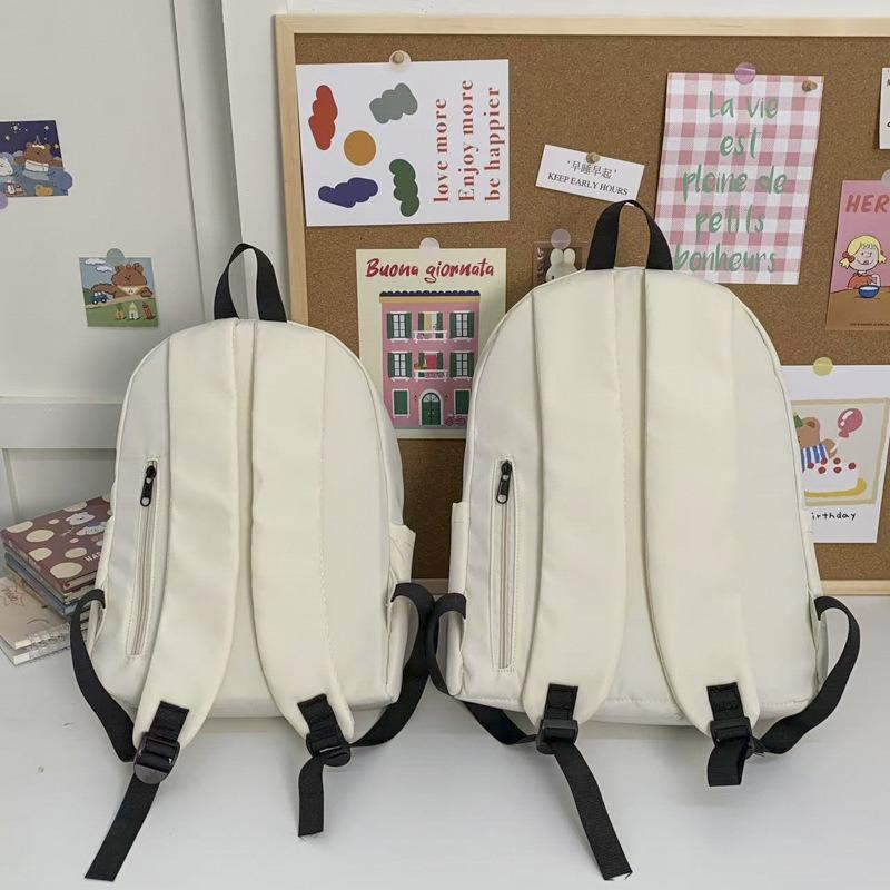 Die neue Schultasche ist ein hochwertiger, frischer, süßer und niedlicher Cartoon-Rucksack, ein leichter Rucksack für den Frühlingsausflug für Schüler der Sekundarstufe I