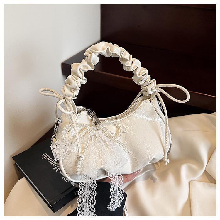 

Niche design personalized trend messenger bag summer new portable crescent bag women білий