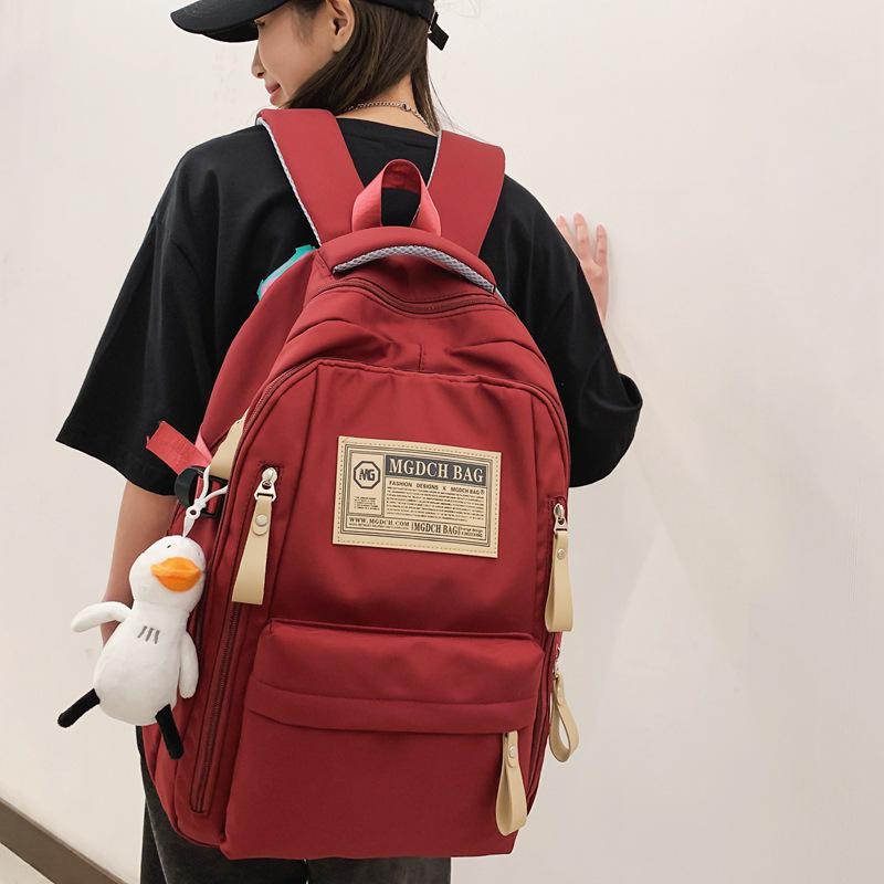 Fashionable Water-Repellent Student Backpack: Trendy High-Capacity Design for Couples