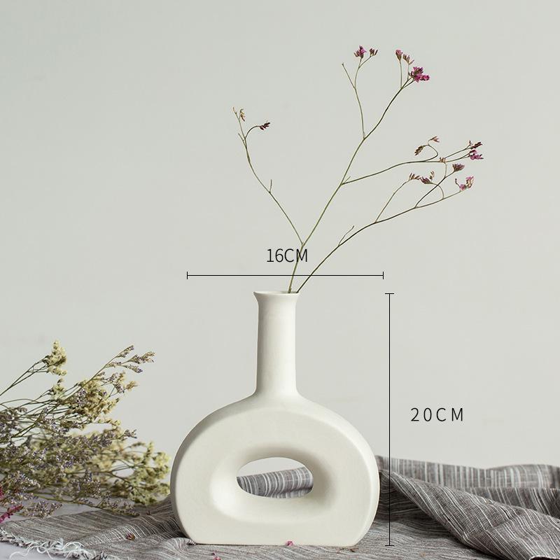 White Ceramic Vase with Dried Baby's Breath for Living Room or Dining Table Decoration