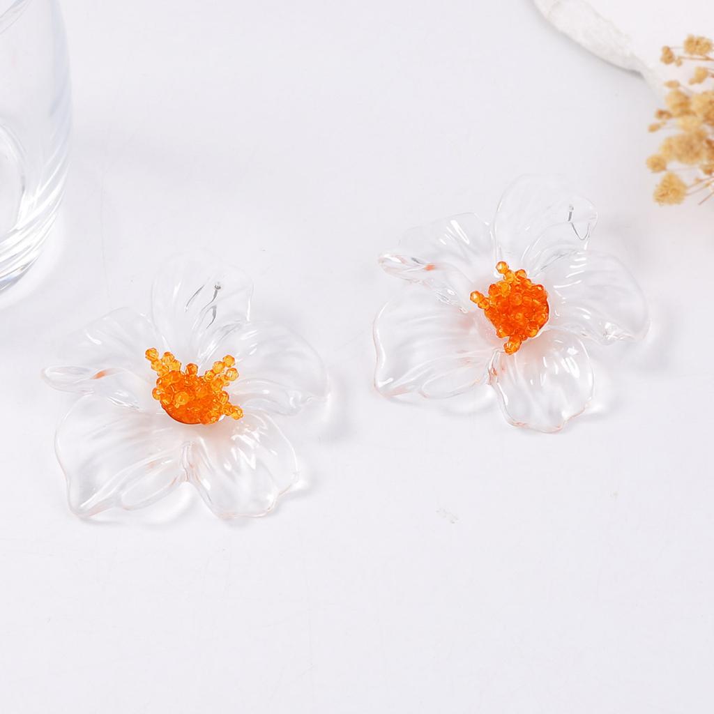 Exaggerated, individualistic, trendy and fashionable acrylic transparent flower stud earrings are versatile and stylish for street style