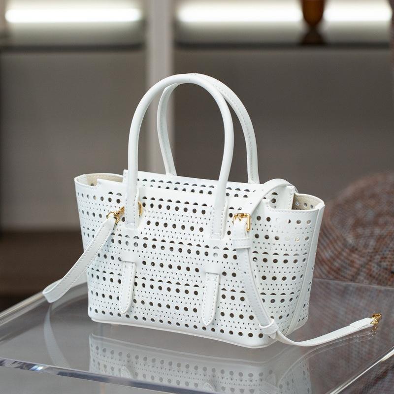 2025 New Genuine Leather Women's Bag 20CM Hollow Carving Small Basket Mini Handheld Single Shoulder Small Bag Cross Border