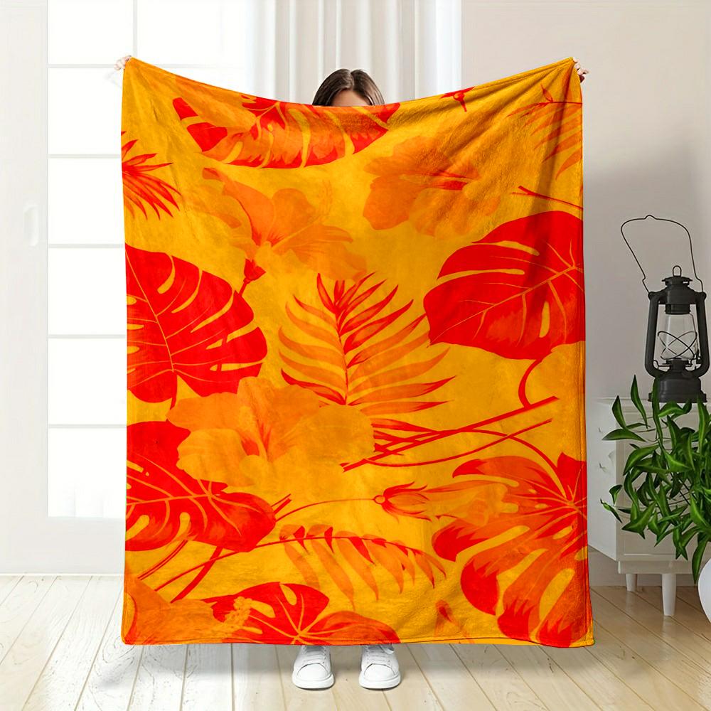 Tropical Floral Orange and Red Design Patterned flannel blanket perfect for the bedroom living room, sofa, or a little nap