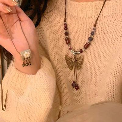 Retro Ceramic Butterfly Bell Pendant Necklace Women's New Trendy Long Sweater Chain with Accessories