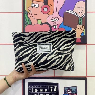 Zebra Print Korean Fashion Women's Makeup and Toiletry Handbag with Large Capacity.