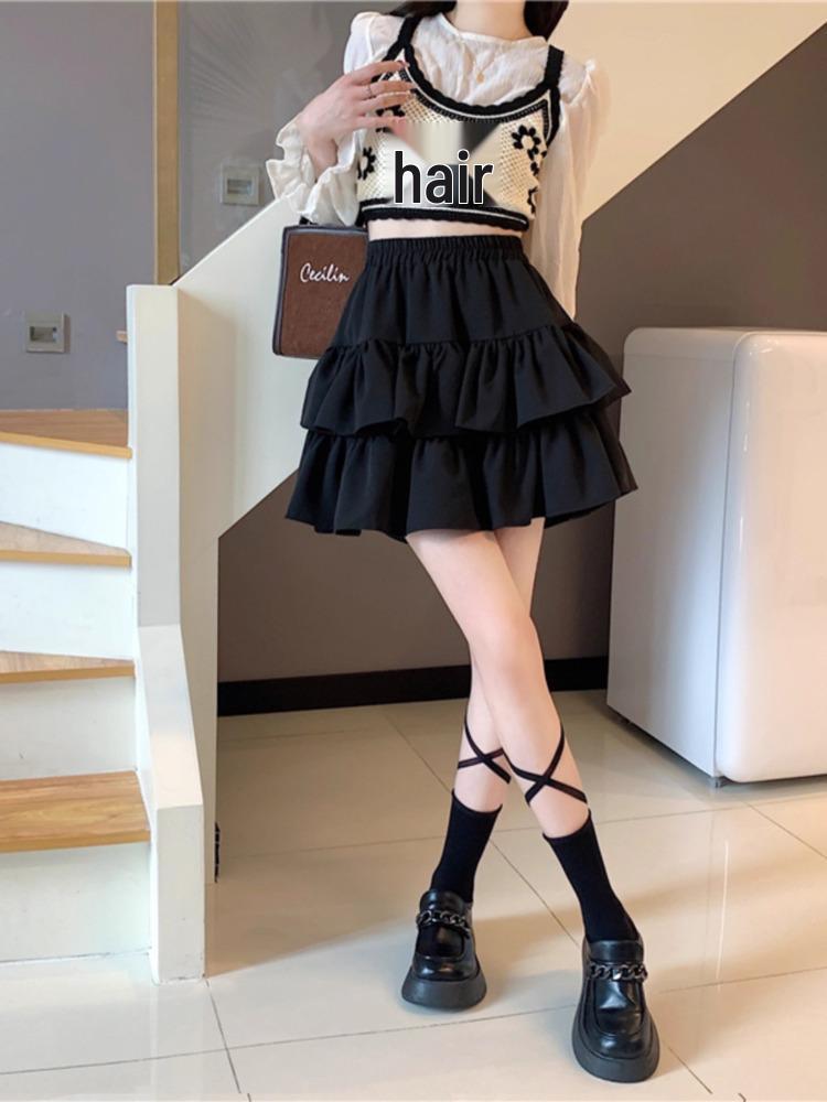 Modischer schwarzer Midi-Rock 2025: Rüschen-Schlankheitsdesign, Hohe Taille, Große Größen, Frühjahrs- und Herbst-Puff-Stil für Damen