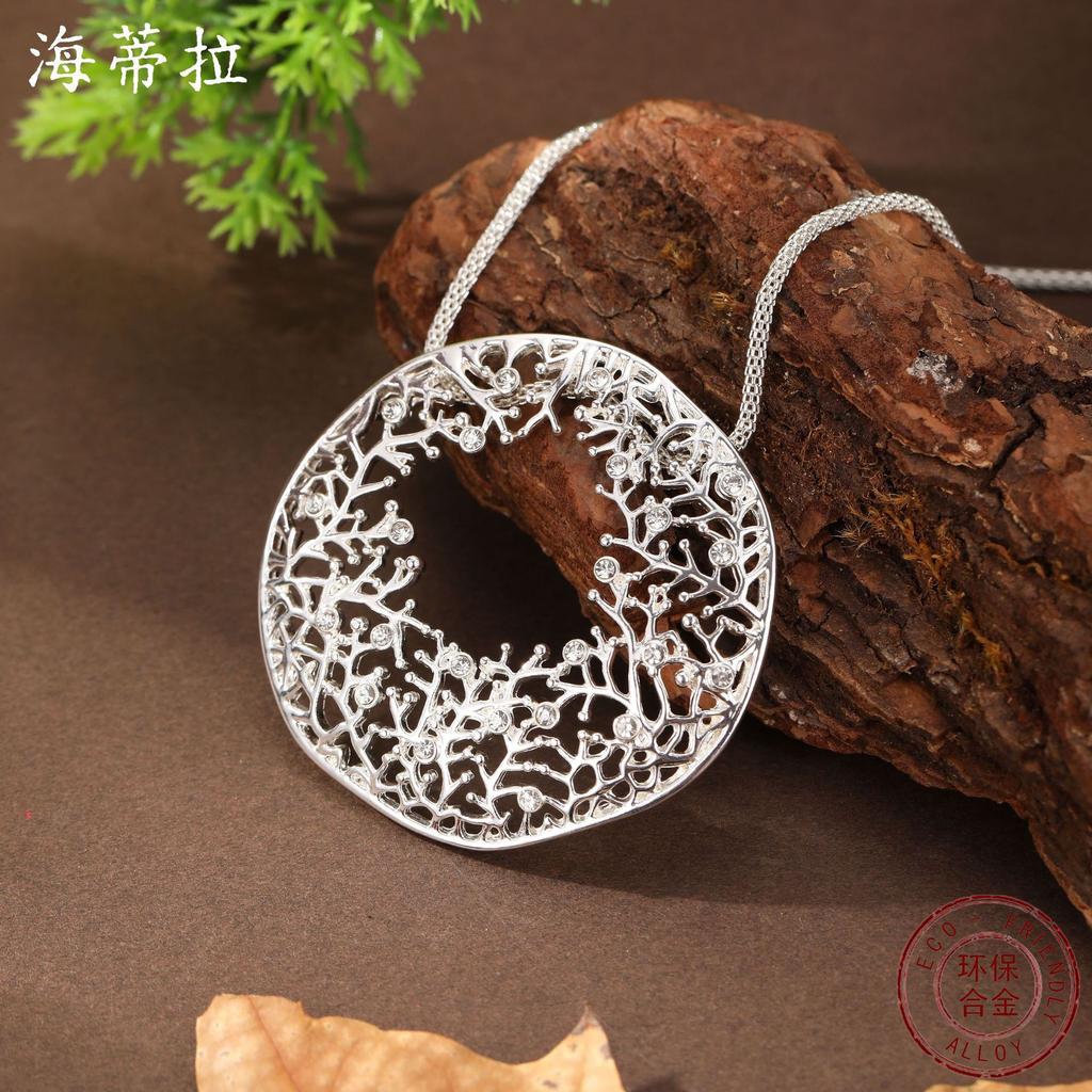 New round hollow irregular coral pendant women's high sense diamond-set geometric coral necklace