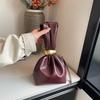 Niche retro pleated design handbag women's 2026 early autumn simple and versatile mini hand carry cloud bag