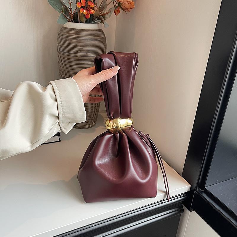Niche retro pleated design handbag women's 2026 early autumn simple and versatile mini hand carry cloud bag