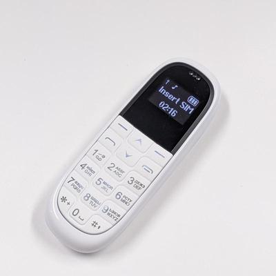 KK1 Mini CellPhone 0.66inch OLED Screen Bluetooth 3.0 Earphone Voice Changer Dialer Automatic Call Recording Super Light Portable Unlocked Cellphone