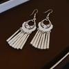 Retro Ethnic Tassel Earrings with Metal Texture - Unique and Elegant Design for Women
