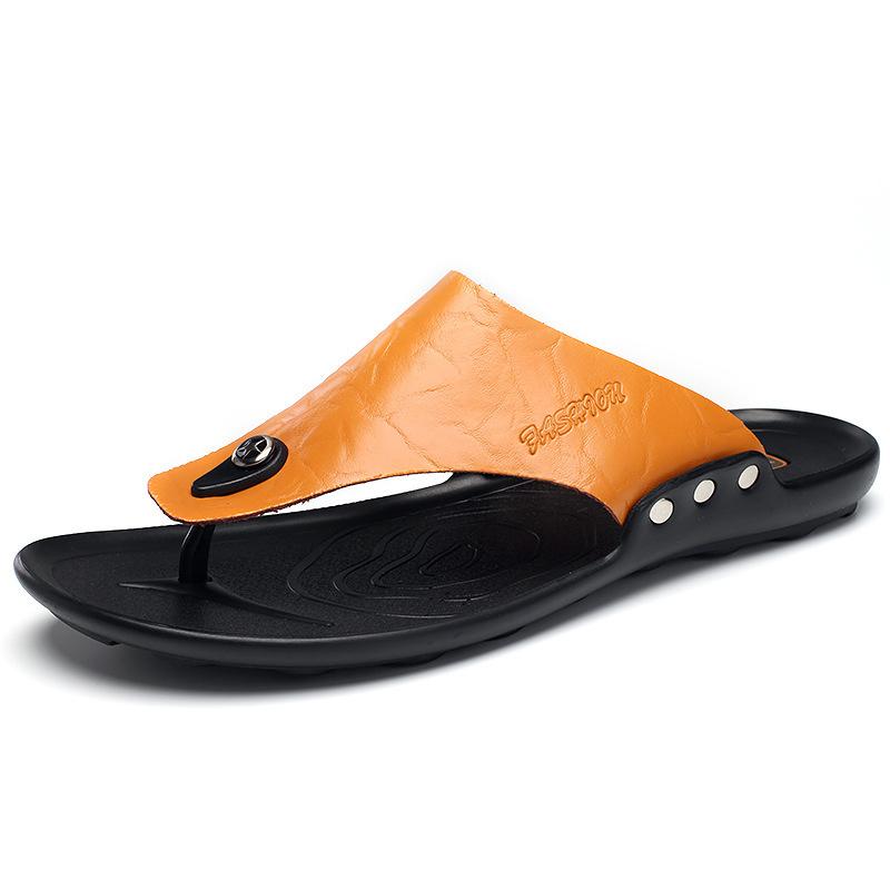 

Summer flip-flops men wearing slippers youth tide shoes soft-soled rivets toes beach shoes cowhide slippers men 45 светло-коричневого
