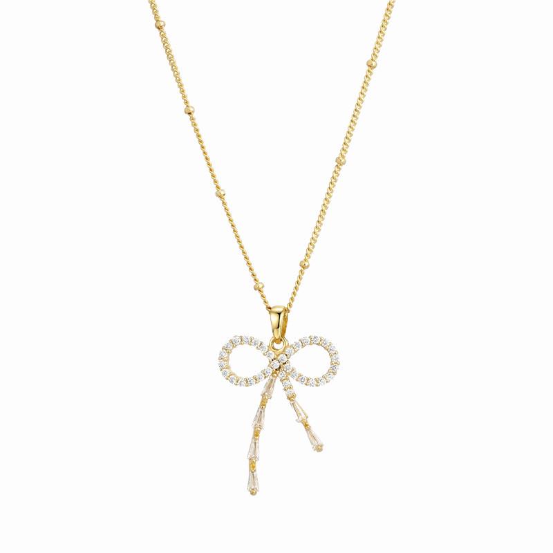 Золотое 18 каратное колье-бантик с цирконием на тонкой бриллиантовой цепочке золотой