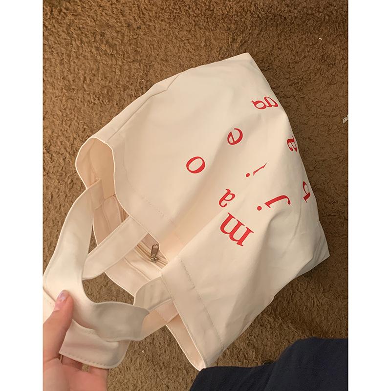 Korean version of casual large-capacity underarm bag women's 2025 new simple letter print tote bag versatile shoulder bag