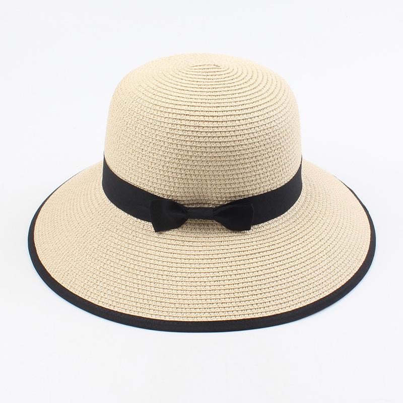 Women's Korean Style Straw Sun Hat with Bow - Casual, Versatile, and Simple Design for Summer Outings.