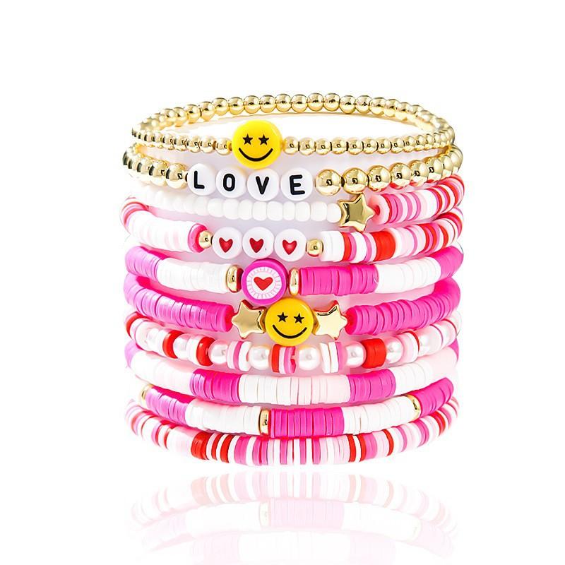 Korean version of fashion new multi-layer elastic thread soft pottery love smiley face bracelet set retro handmade pearl jewelry women