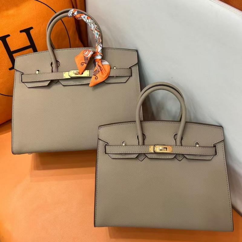 Two-layer EP Palm Pattern Leather Color Matching Platinum Bag (H13-2530BK)