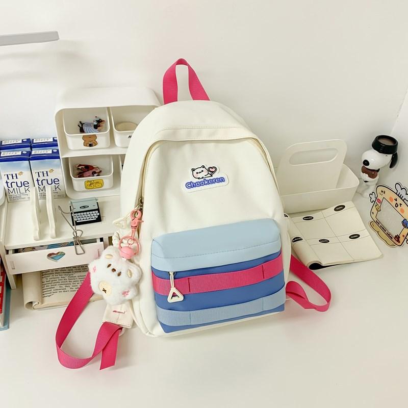 New Small Fresh Contrast Bag Light and Casual Outdoor Backpack High capacity Backpack for Junior and Senior High School Students.