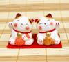 Ebisu and Daikoku cats, each H6 x 5 x 5.5cm, Made in Japan.