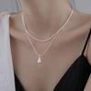 Simple and versatile double-layer water drop necklace, female cold personality temperament, advanced rice grain collarbone chain, neck chain.