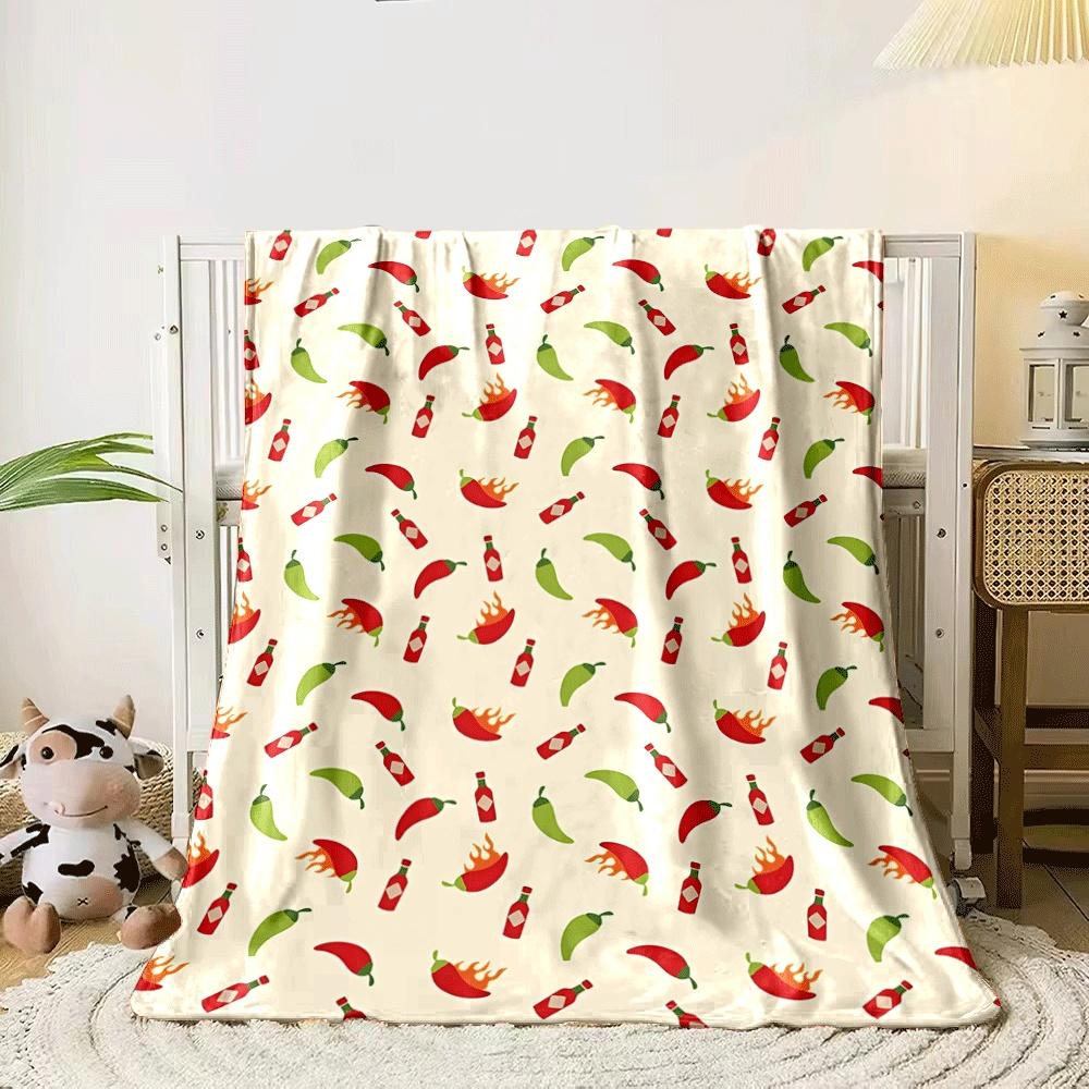 The pattern shows chilies, hot sauce bottles, and flaming chili peppers. for all seasons blanket lunch break throw gift 80cm x 120cm