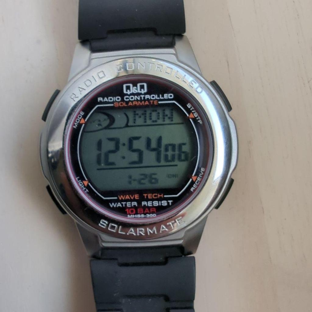 Used Q&Q Digital Radio-Controlled Solar Watch
