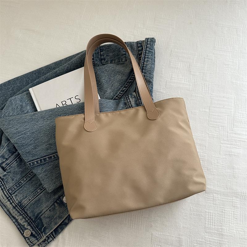 2025 New Fashion Versatile Shopping Bag Large Capacity Handbag Travel Storage Bag Light Commuter Tote Women's Bag