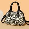 Trendy and fashionable portable women's bags, new zebra pattern tote bags, personalized and popular shoulder messenger bags.