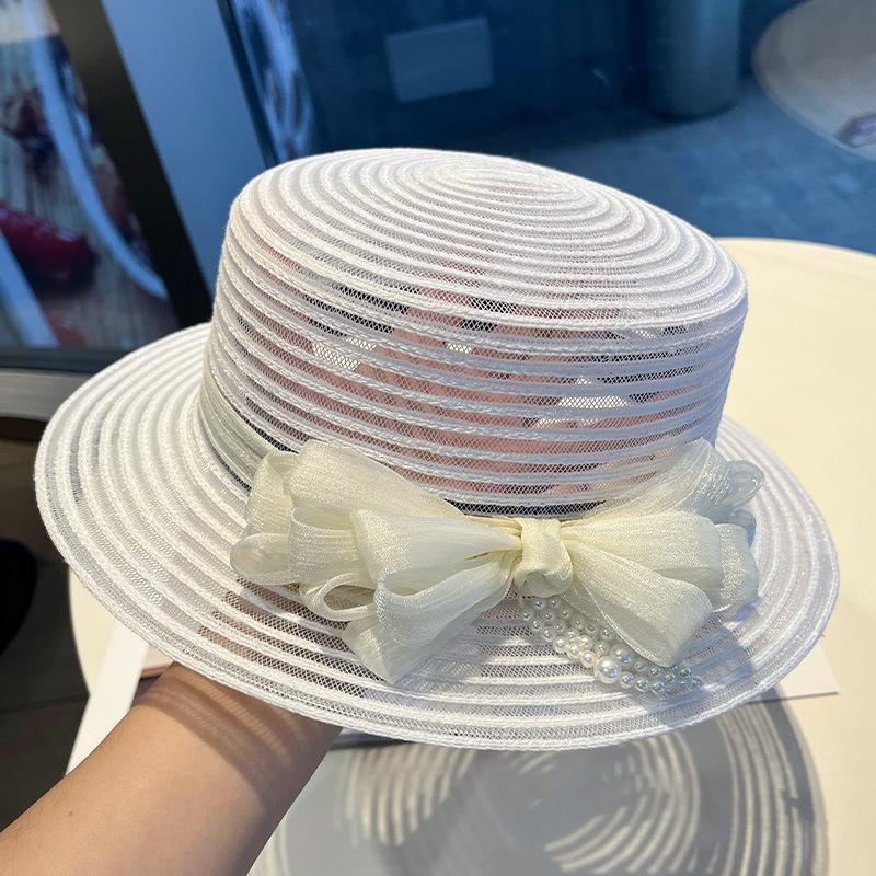 New bow pearl decoration women's summer face covering sunscreen straw hat British retro sunshade fashionable and elegant mesh gauze hat