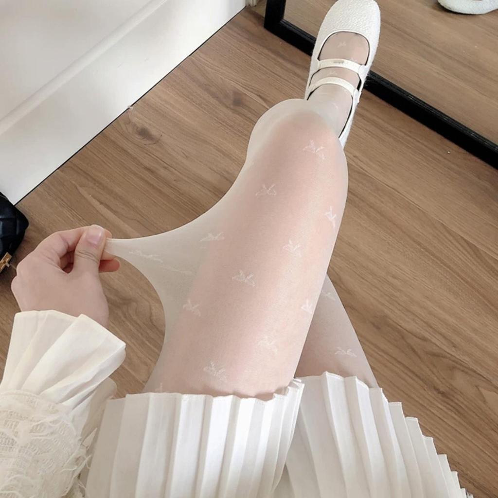 Ultra-Thin Black Polka Dot Stockings for Women - Snag-Resistant, Highly Transparent, Spring/Summer Style, Bare Leg Feel.