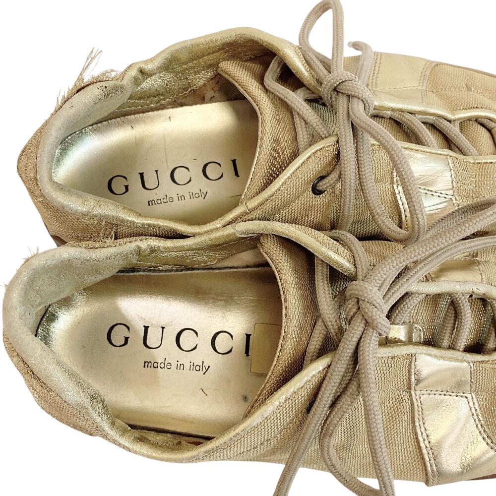 Gucci Niedrig geschnittene Leder-Sneaker goldfarbenes Leder Gebraucht