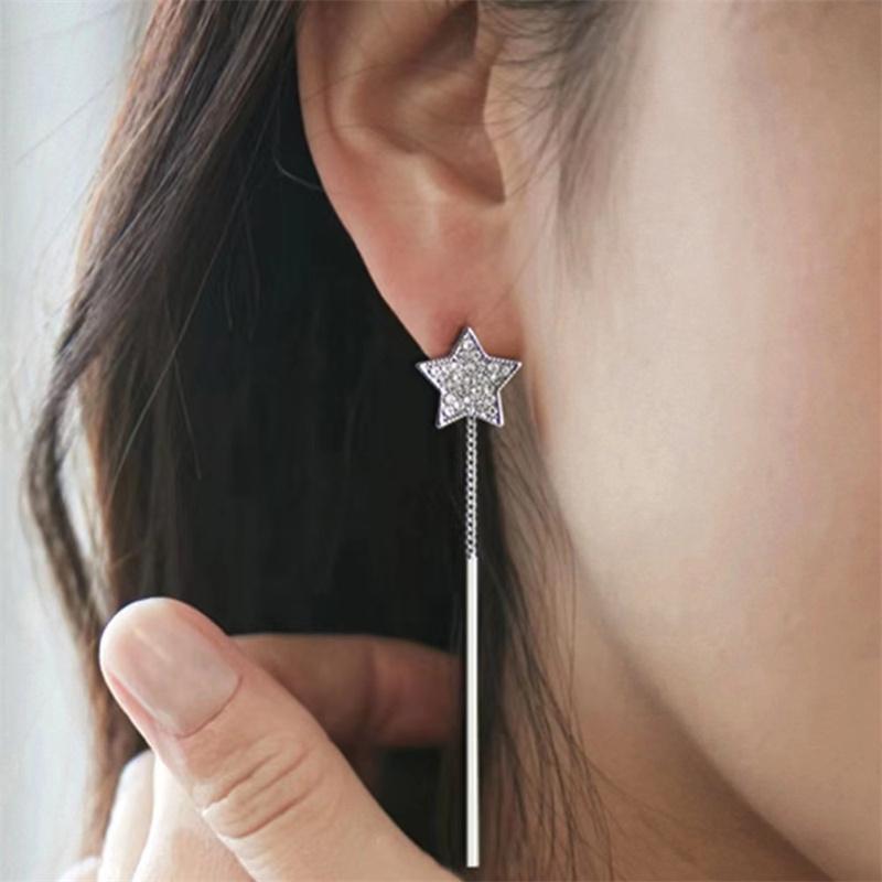 

Длинные серьги с кисточками и пятиконечной звездой с бриллиантами