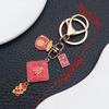 2025 New Year Red Enamel 'Safe and Happy' Persimmon Keychain – Blessing Ornament for Prosperity