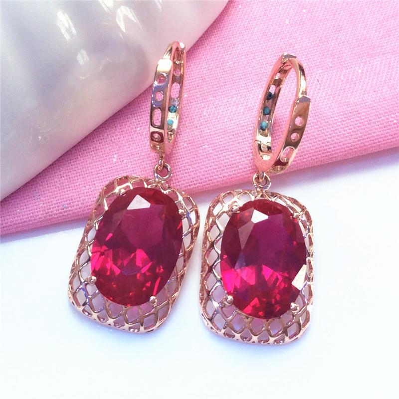 Exquisite Russian 585 Purple Gold Hollow Mesh Egg Surface Redstone Earrings Fashion Luxury Temperament Colored Gold Earrings