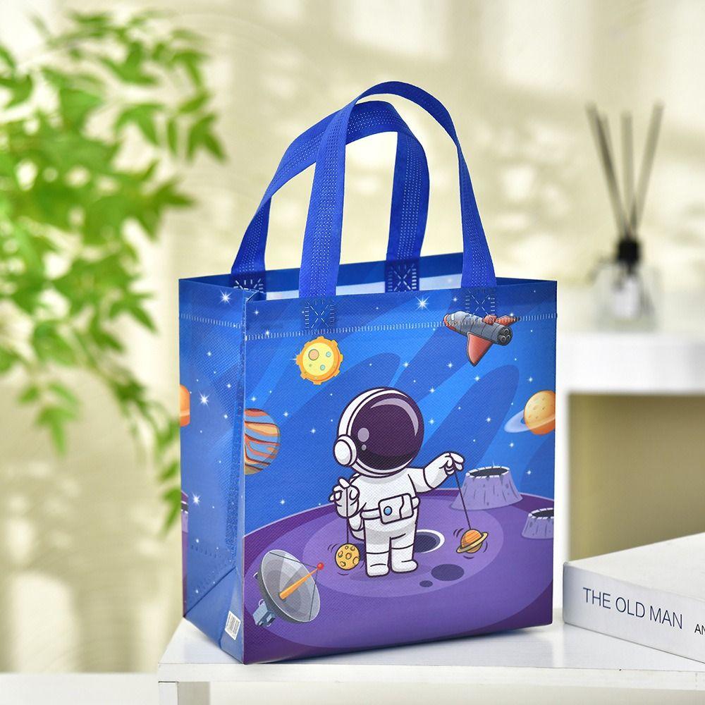 The New Non-woven Fabric Printed Handbag Cartoon Print Astronaut Toy Storage Backpack Large Capacity Candy Gift Bag
