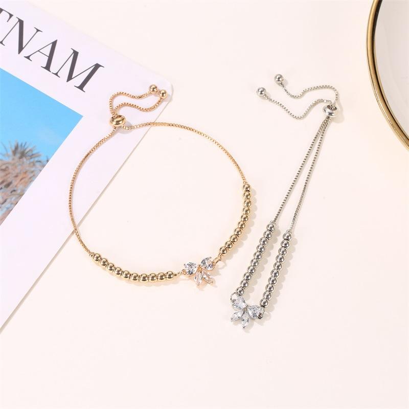 Fashion bracelet 1PC Korean version bow fresh and delicate sweet beaded round bead inlaid zircona adjustable slightly серебряный