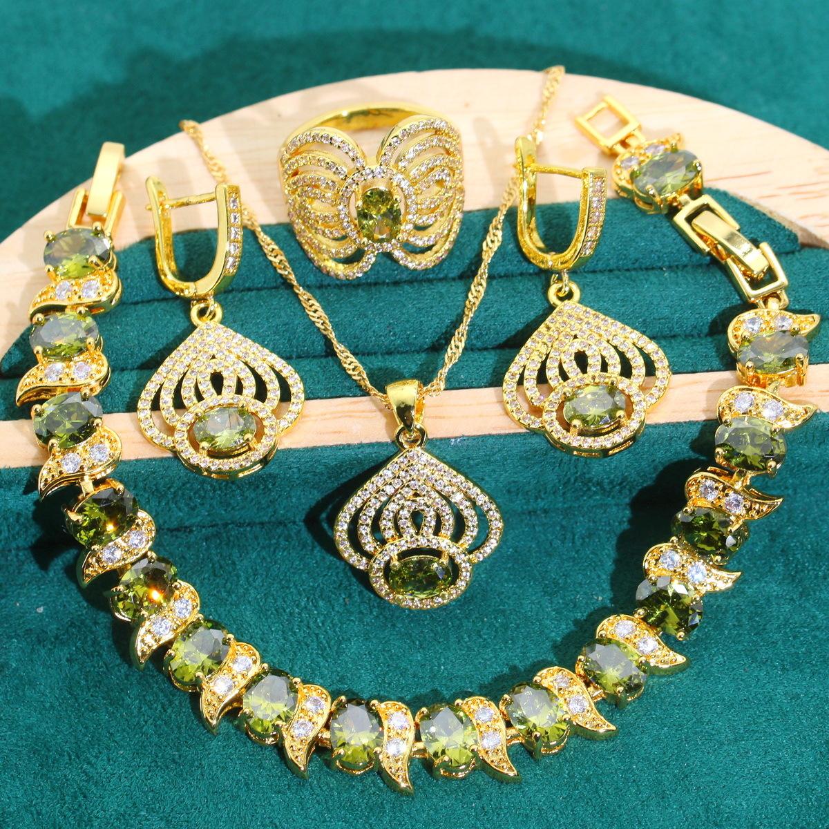 

Европейская и североамериканская мода Классика Цирконий Ожерелье Серьги Браслет Кольцо Комплект Изумруд 10 yards