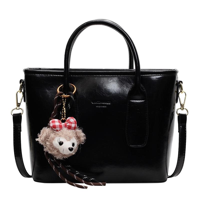 Simple and fashionable handbag spring new retro texture bucket bag solid color commuter shoulder messenger bag